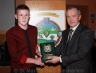 Michael Hasson presents Enda Mc Ferran the Ulster Under 14 Hurling Feile plaque